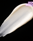 image of Dr.Esthe C Tox eyecream spread against a black background