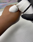 Picture of esthetician hand applying HOP+ Pro Volumizing Mousse at Skin Accord in New Lenox, IL