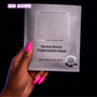 Hand holding a Dermathod Derma Revive Triple Action Mask against a black background