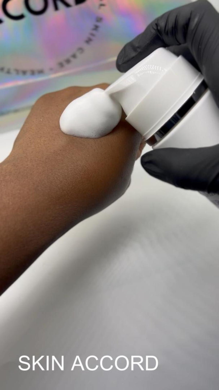 Picture of esthetician hand applying HOP+ Pro Volumizing Mousse at Skin Accord in New Lenox, IL 