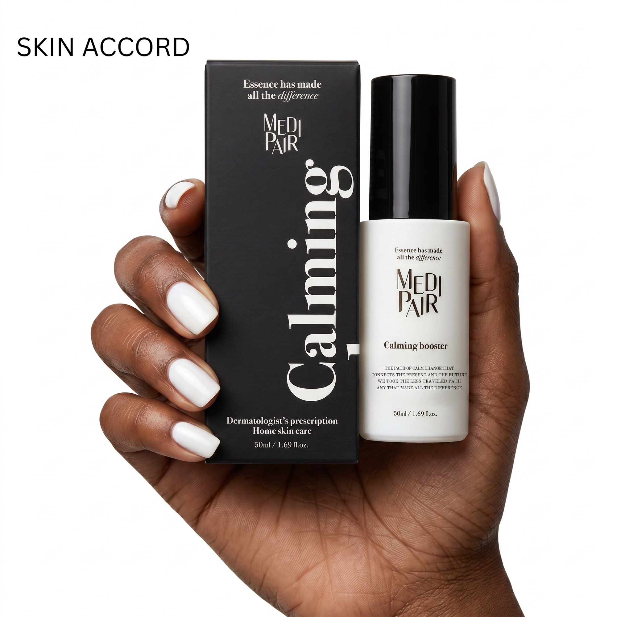 Hand holding Medi-Pair Calming booster bottle and packaging on a white background