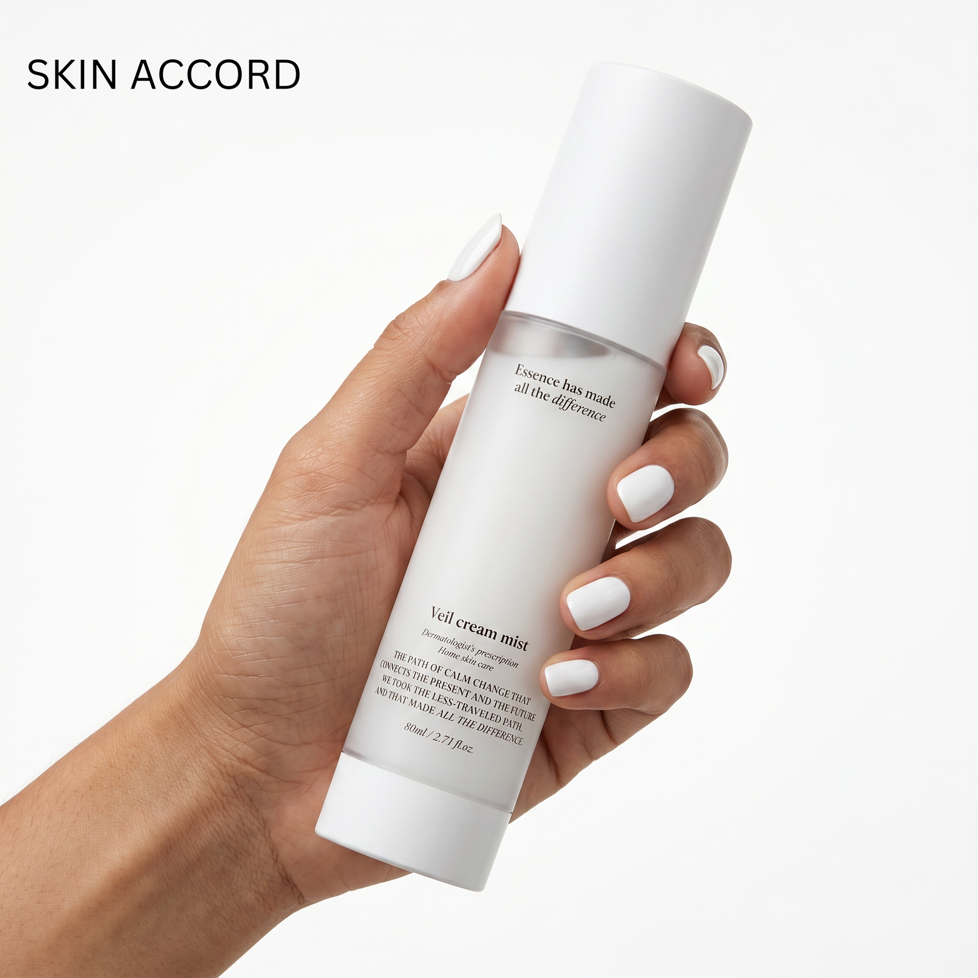 Hand holding Medi Pair Veil Cream Mist bottle against a white background