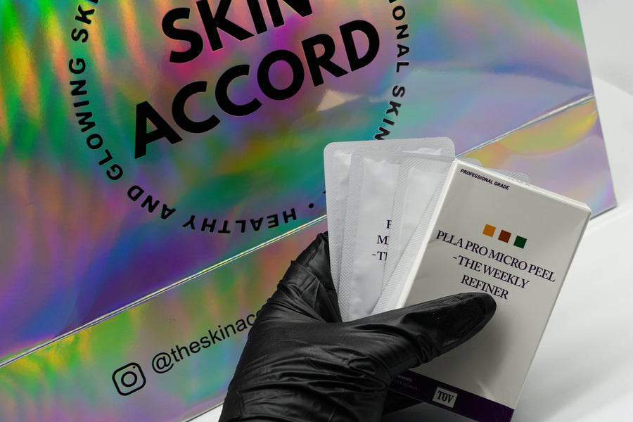 Black gloved hand holding House of PLLA (HOP) Micro Peel next to Skin Accord bag in New Lenox, IL 