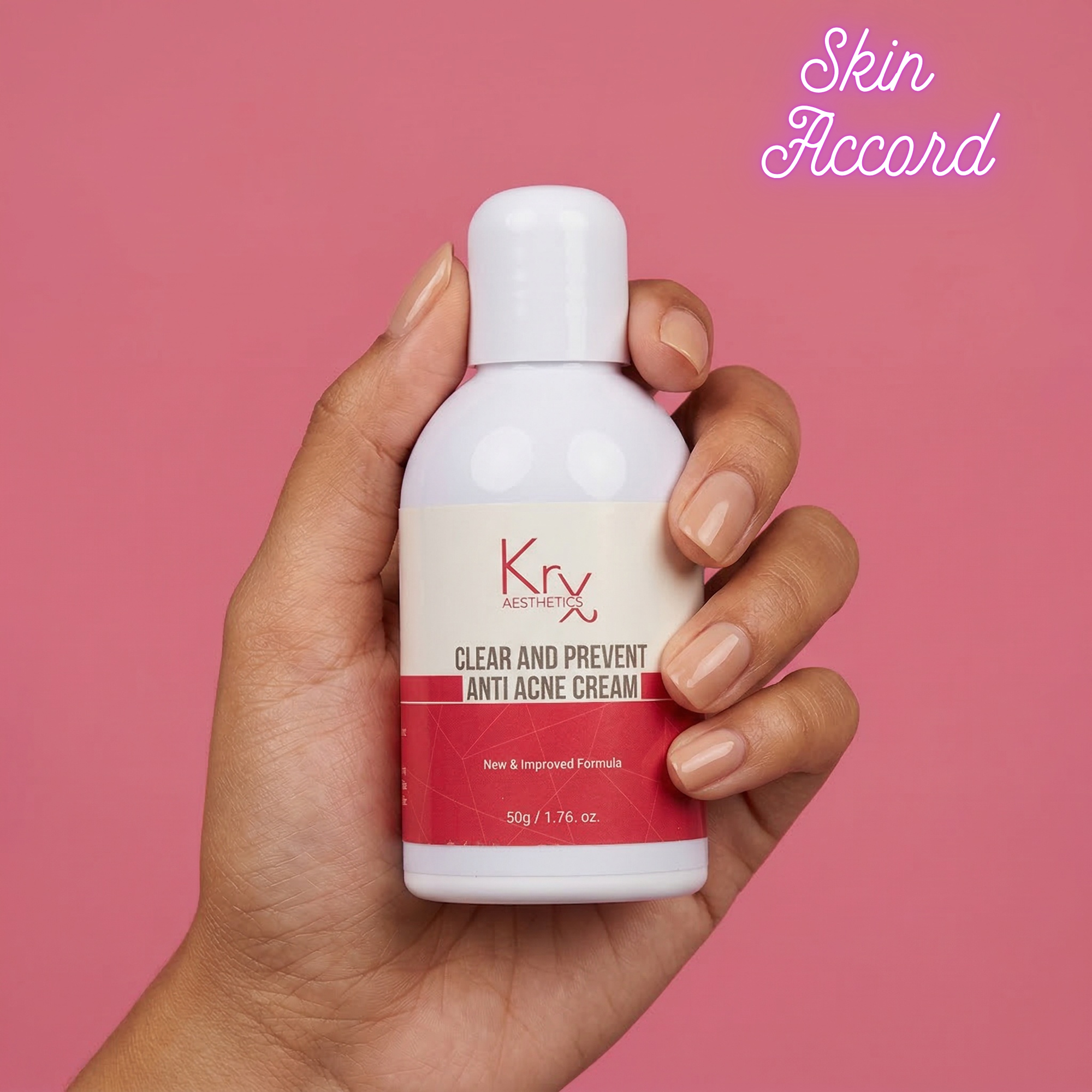 Hand holding a bottle of KRX Anti Acne Cream against a pink background with 'Skin Accord' branding.