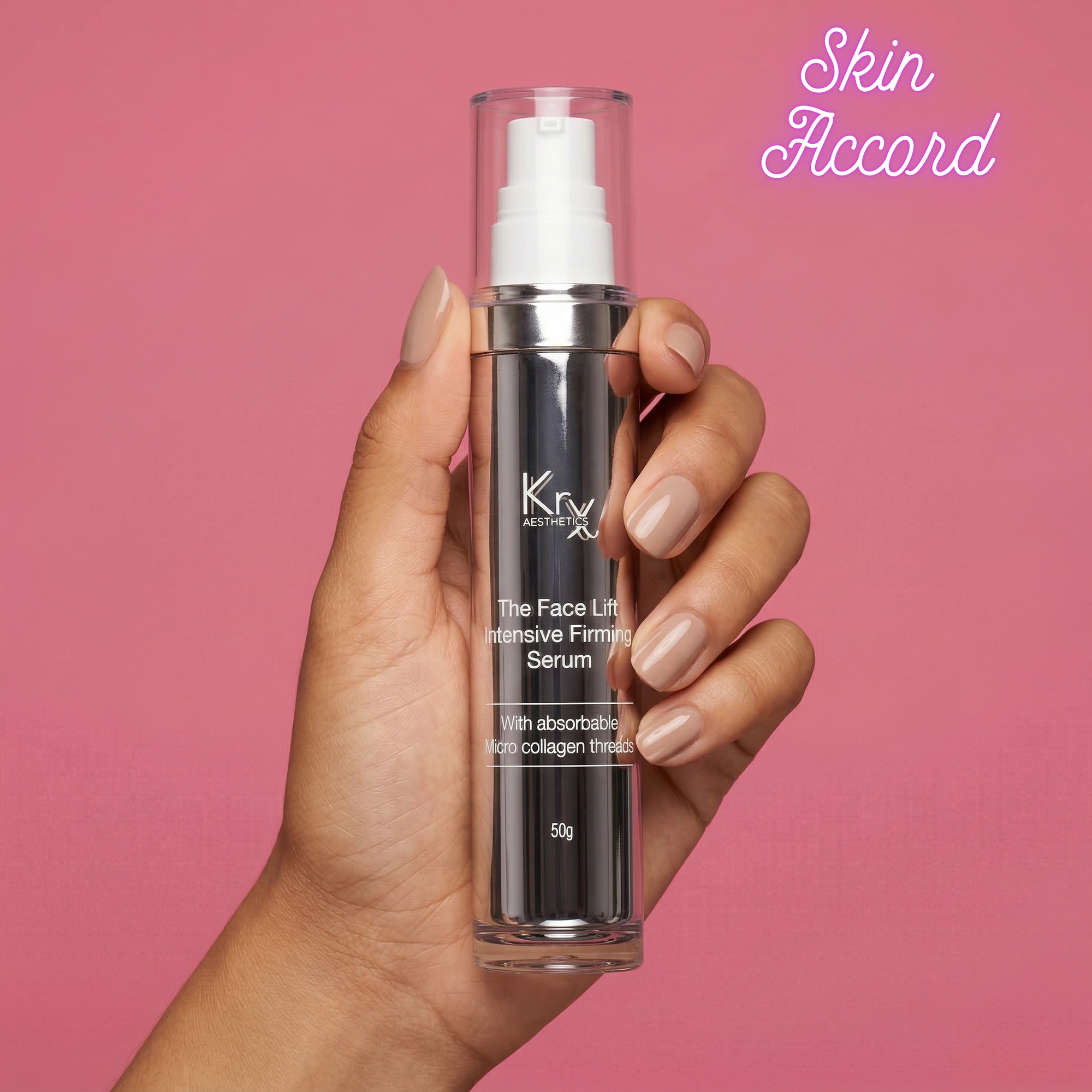 Hand holding KRX Aesthetics Face Lift Intensive Firming Serum bottle with 'Skin Accord' branding on a pink background